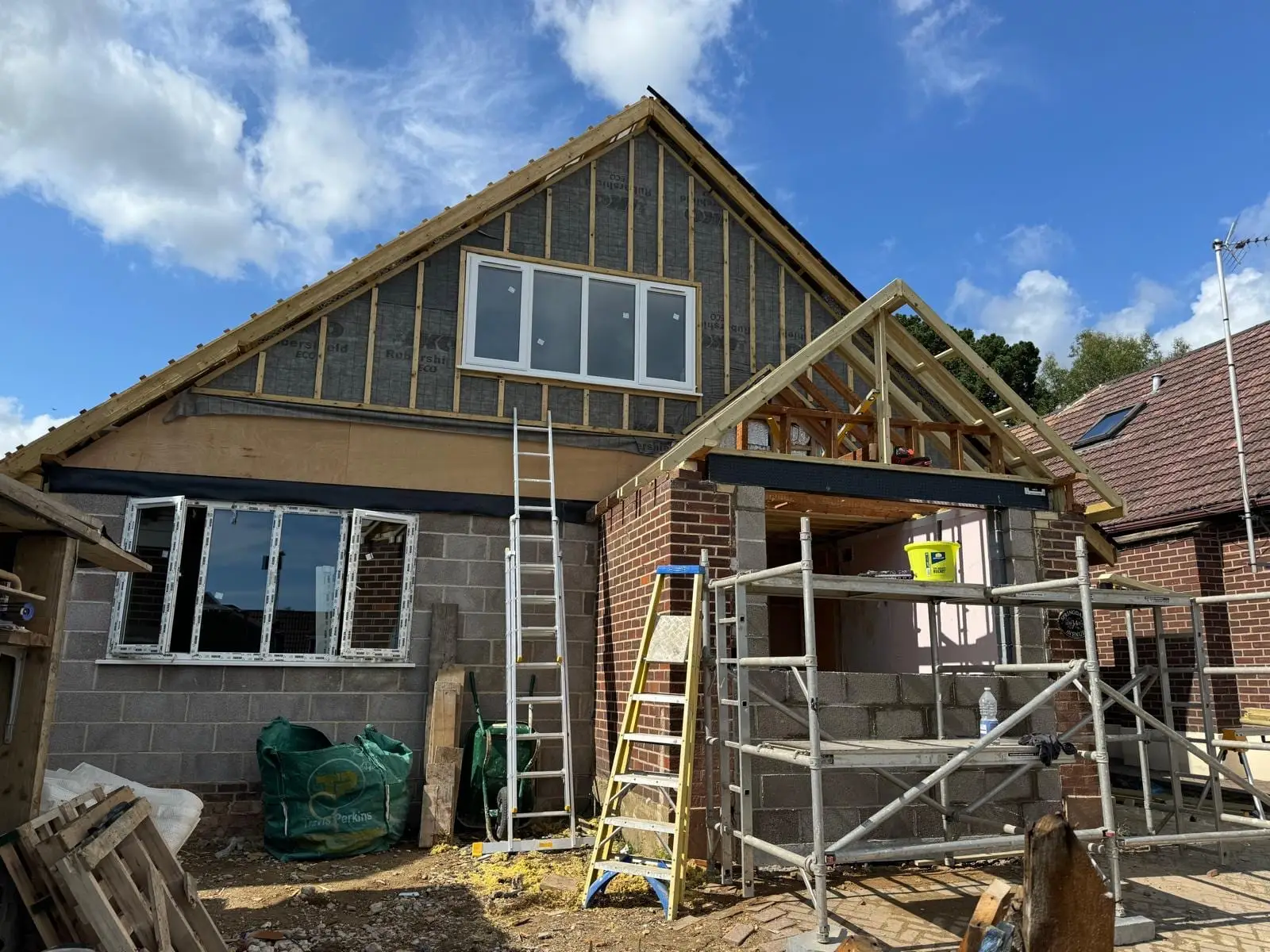 The new gable and timber porch frame with the windows fitted