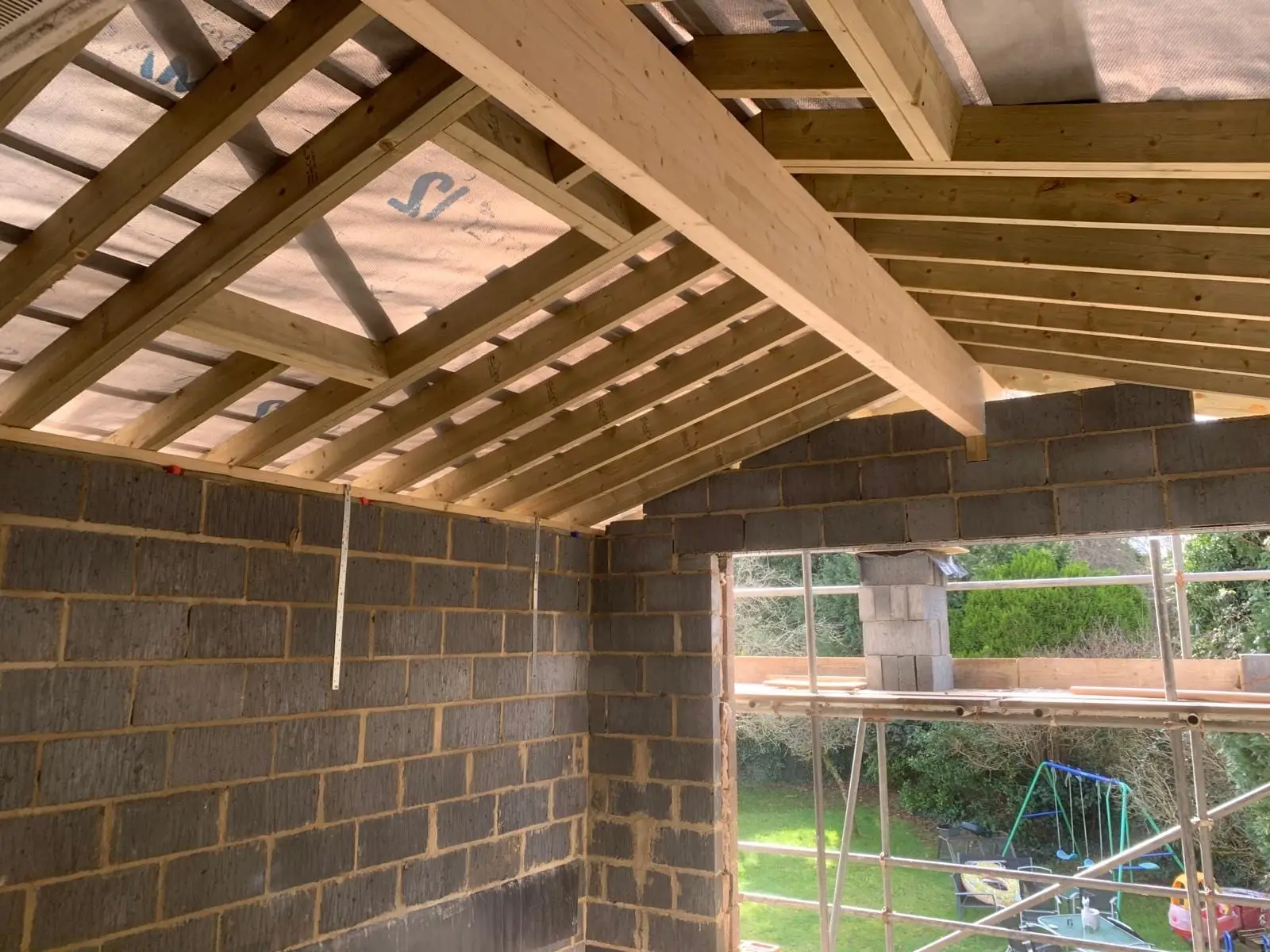 A new cut roof over a blockwork outbuilding